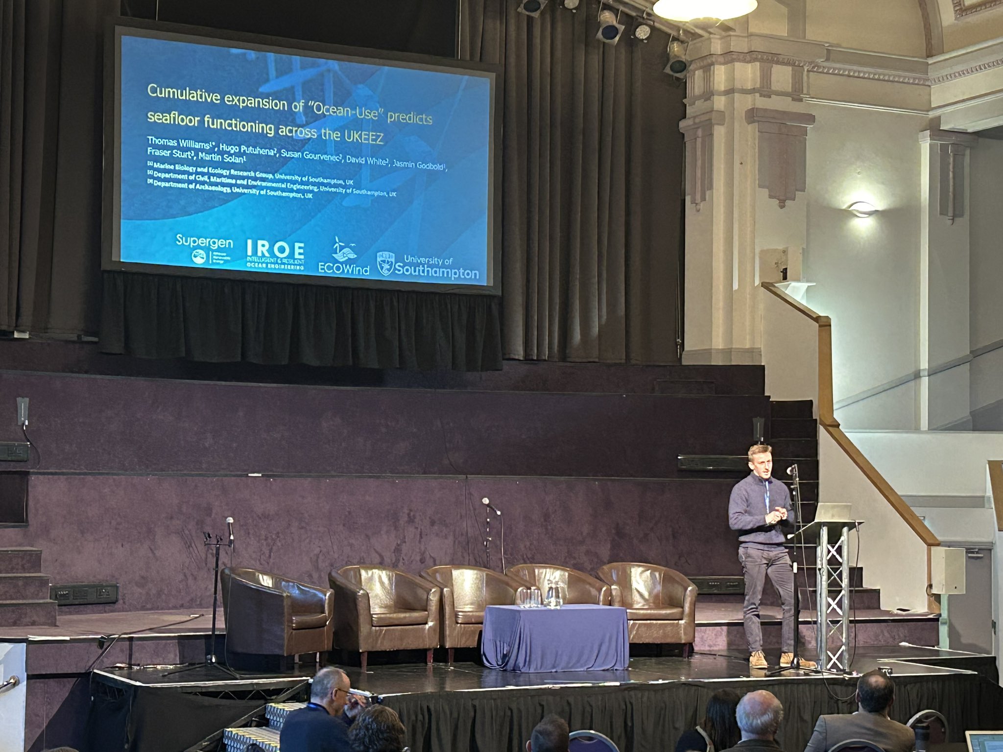 Tom Williams presenting research at a conference